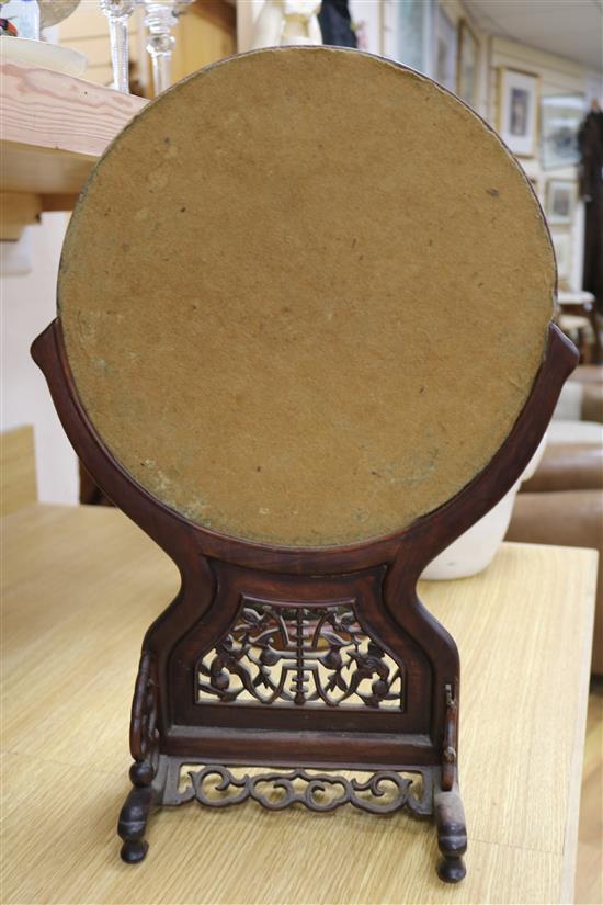 A Chinese hardwood mirror